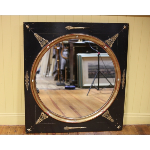 308 - A CONTINENTAL EBONISED PARCEL GILT AND GILT BRASS MOUNTED MIRROR the circular plate with a gilt slip... 