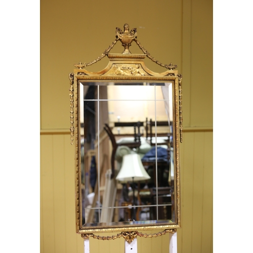 310 - AN ADAM STYLE GILT FRAME MIRROR the rectangular bevelled glass plate within an egg and dart and bead... 