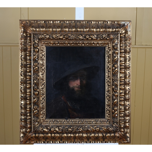 311 - 19th CENTURY CONTINENTAL SCHOOL  HEAD AND SHOULDER PORTRAIT OF A BEARDED MAN WEARING A HAT in an orn... 