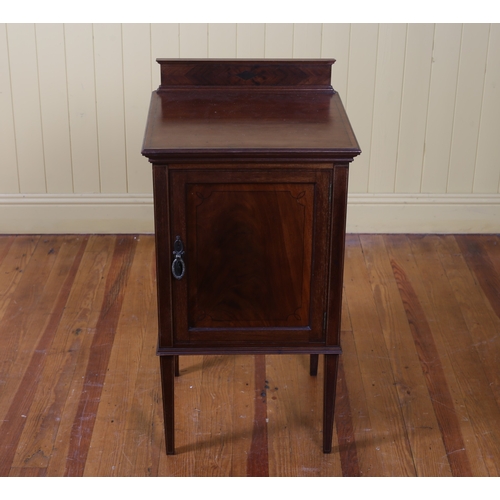 32 - AN EDWARDIAN MAHOGANY INLAID PEDESTAL of rectangular outline the shaped top with moulded back above ... 