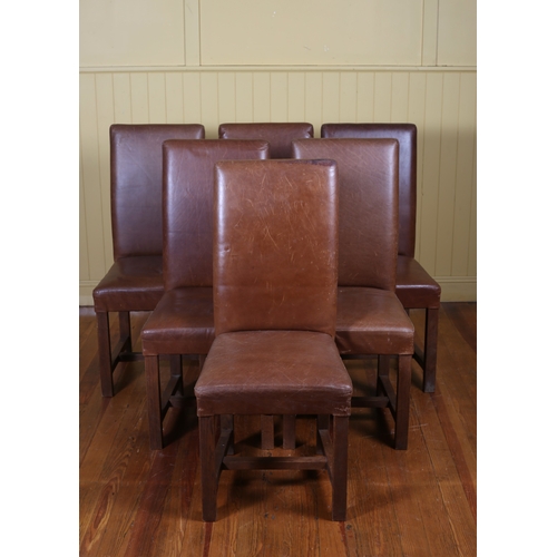 327 - A SET OF SIX OAK AND HIDE UPHOLSTERED DINING CHAIRS each with a rectangular upholstered back and sea... 