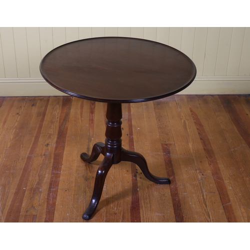 33 - A 19TH CENTURY MAHOGANY SNAP TOP TABLE of circular outline the shaped dish top above a baluster colu... 