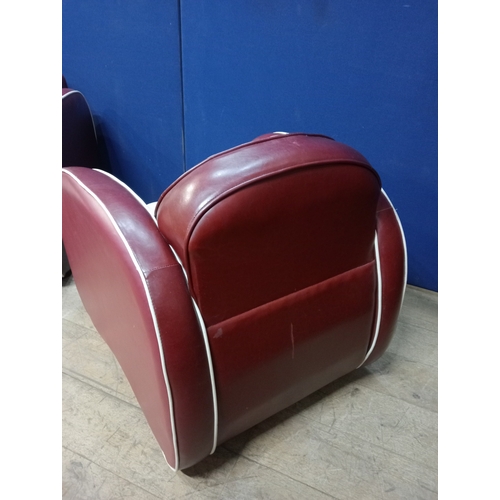 363 - A PAIR OF RETRO RED AND WHITE RIBBED TUB SHAPED ARMCHAIRS the rectangular arched backs with shaped a... 