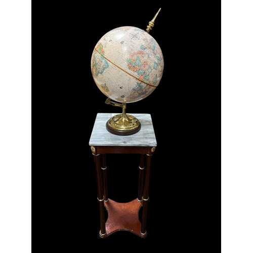 373 - A WORLD GLOBE raised on a stained wood and gilt brass mounted and marble table of rectangular outlin... 