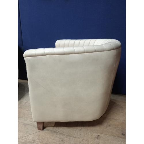 393 - A PAIR OF LEATHER UPHOLSTER TUB SHAPED CLUB ARMCHAIRS with ribbed back and sides on square tapering ... 