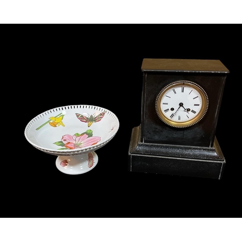 409 - A VINTAGE BLACK MARBLE MANTEL CLOCK the rectangular case with enamel dial and Roman numerals inscrib... 