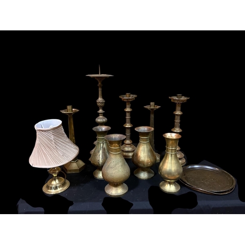 416 - A COLLECTION OF VINTAGE BRASSWARE to include two pairs of brass vases each of baluster form, two pai... 