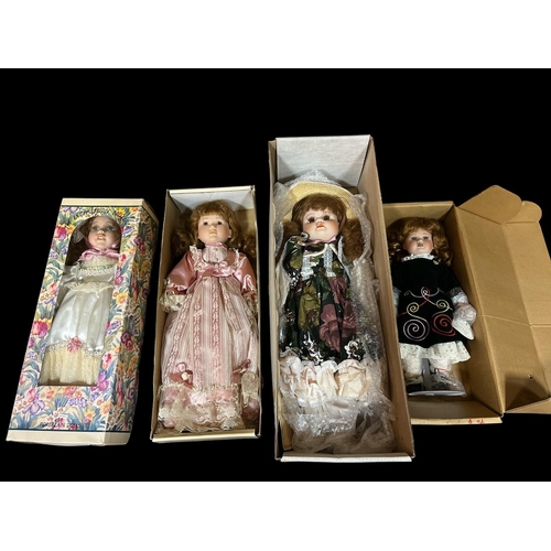 417 - A COLLECTION OF SEVENTEEN PORCELAIN DOLLS