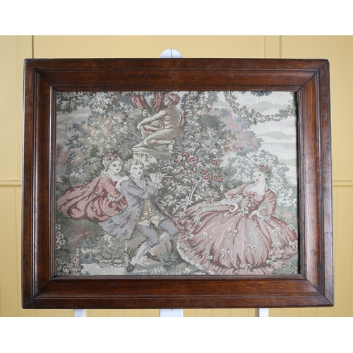 449 - A FRAMED TAPESTRY depicting figures in a floral garden in oak frame 65cm (h) x 79cm (w)