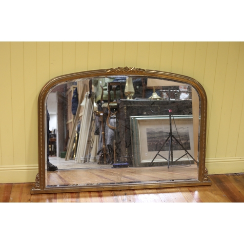 461 - A VICTORIAN STYLE GILT FRAME OVERMANTEL MIRROR the rectangular arched plate within a beadwork frame ... 