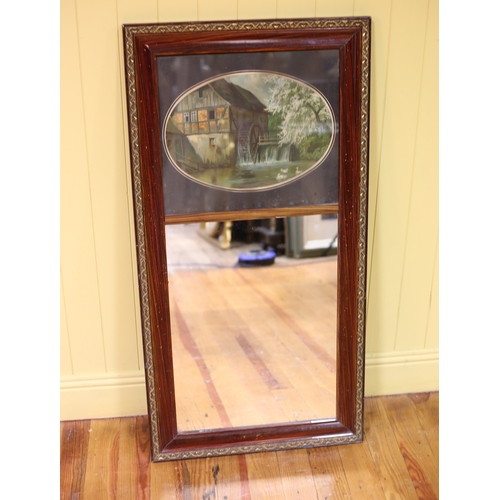 463 - A VINTAGE STAINED WOOD AND PARCEL GILT MIRROR the rectangular plate within a stylised foliate frame ... 