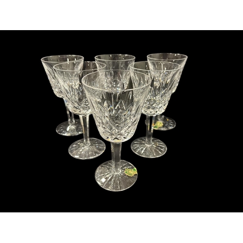 475 - A SET OF SIX WATERFORD CUT GLASS WINE GLASSES