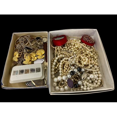 508 - A COLLECTION OF COSTUME JEWELLERY to include bangle, necklace, buckles, simulated pearl necklaces, e... 