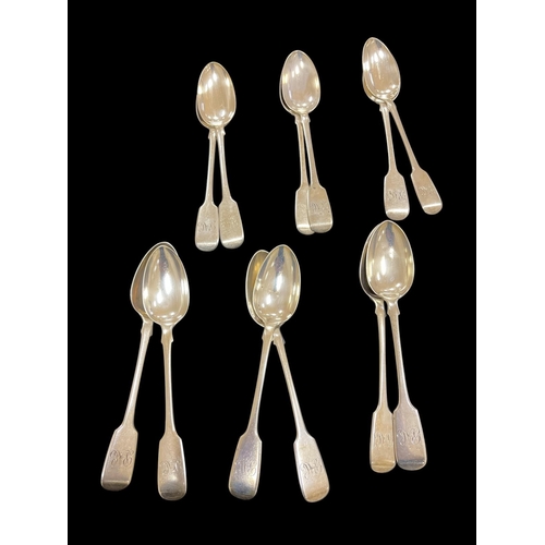 529 - A SET OF TWELVE SILVER TEASPOONS Dublin 1895 maker J.S. inscribed 'Donegan' monogrammed 318g