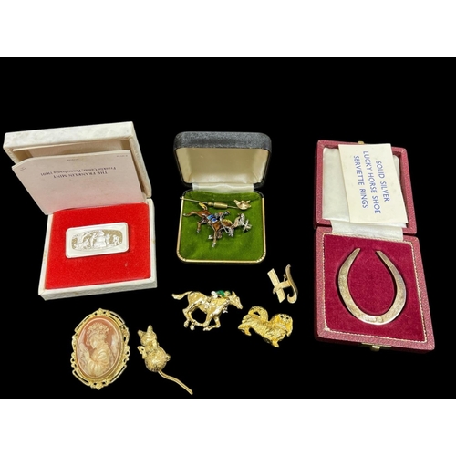 537 - A COLLECTION OF JEWELLERY to include a silver and enamel horse bar brooch, a fox head stick pin, a F... 