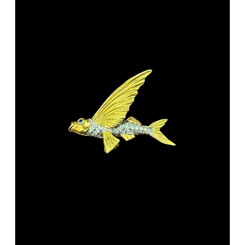 547 - AN 18CT GOLD DIAMOND AND EMERALD BROOCH DESIGNED AS A FLYING FISH