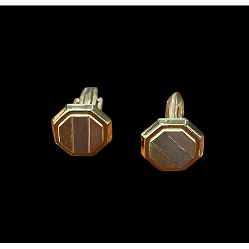 549 - A PAIR OF 18CT THREE GOLD COLOURED  CUFFLINKS of octagonal form