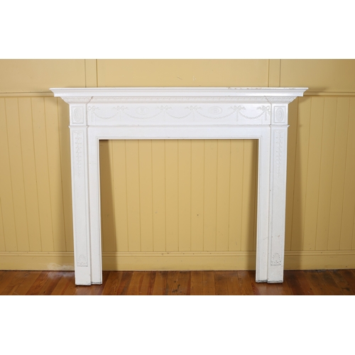 608 - AN ADAM STYLE WHITE PAINTED PINE CHIMNEY PIECE the rectangular shelf with beadwork decoration above ... 