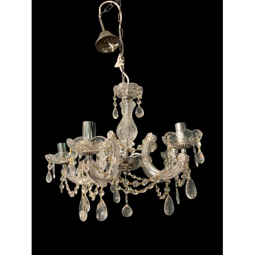 632 - A CONTINENTAL MOULDED GLASS FIVE BRANCH CHANDELIER hung with faceted chains and pendant drops 40cm d... 