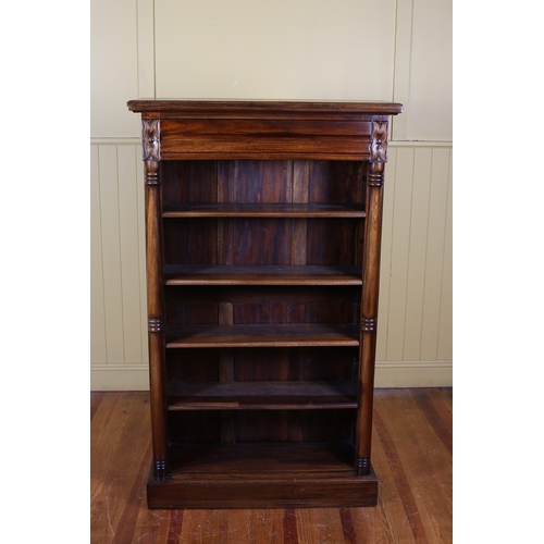 70 - A MAHOGANY FIVE TIER OPEN FRONT BOOKSHELF of rectangular outline the shaped top above a frieze drawe... 