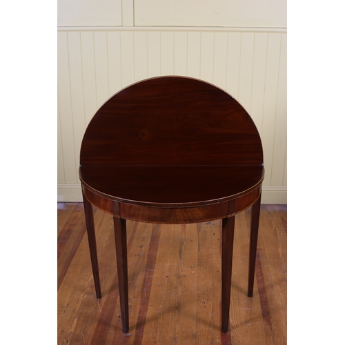 83 - A 19TH CENTURY MAHOGANY AND SATINWOOD INLAID FOLDOVER SUPPER TABLE of demi lune outline the shaped h... 