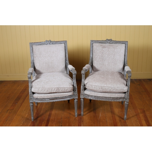 196 - A PAIR OF CONTINENTAL CARVED WOOD GREY PAINTED AND UPHOLSTERED ELBOW CHAIRS each with a rectangular ... 