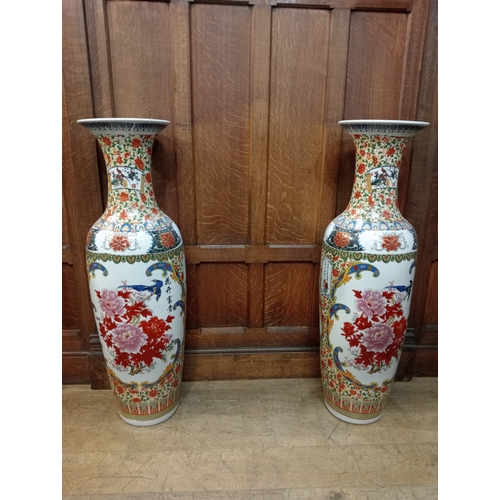 263 - A PAIR OF FAMILLE ROSE STYLE VASES each of bulbous form with flared rim the white ground decorated o... 