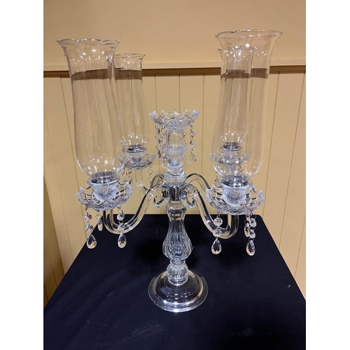 270 - A CONTINENTAL FIVE BRANCH TABLE CANDELABRUM with trumpet shaped shades and drip pans with scroll arm... 