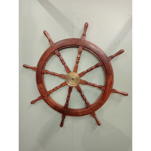 301 - A TEAK AND BRASS SHIP'S WHEEL of typical form 105cm (w)