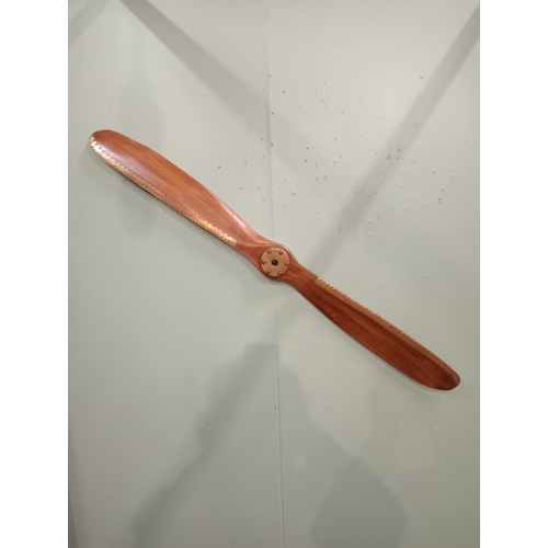 302 - A TEAK AND BRASS BOUND PROPELLOR 150cm (h) 14cm (d) 8cm (d)