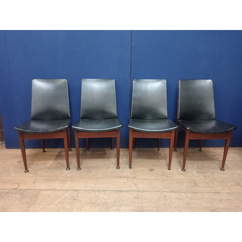 347 - A SET OF FOUR VINTAGE TEAK AND UPHOLSTERED DINING CHAIRS each with a curved back and shaped seat on ... 