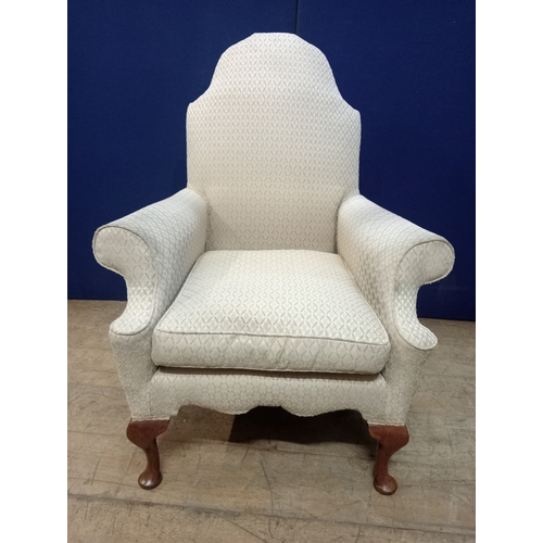 350 - A QUEEN ANNE STYLE STAINED WOOD AND UPHOLSTERED ARMCHAIR the shaped back with scroll over arms and l... 