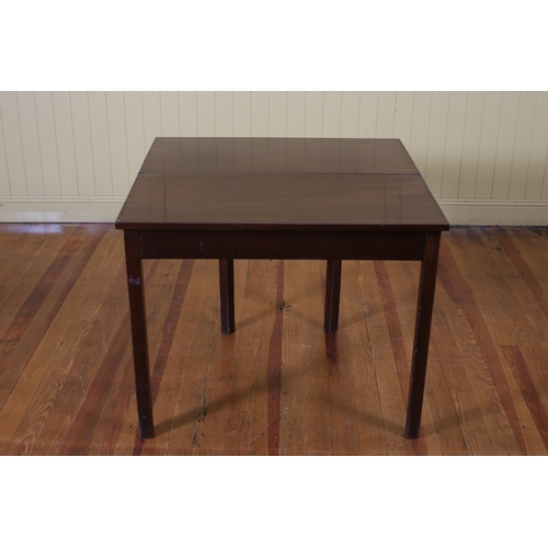 415 - A GEORGIAN MAHOGANY FOLDOVER SUPPER TABLE the rectangular hinged top raised on square moulded legs 7... 