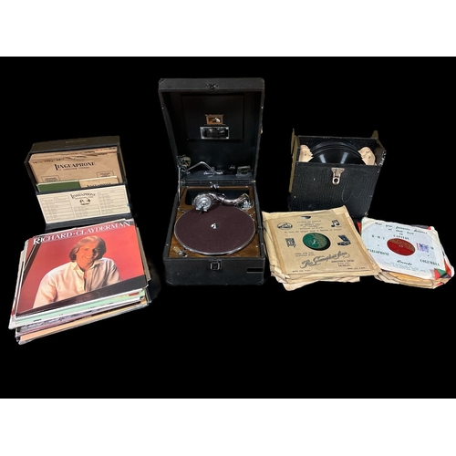 445 - A VINTAGE PORTABLE GRAMOPHONE together with A LARGE COLLECTION OF RECORDS