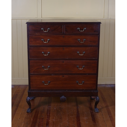 5 - A GEORGIAN MAHOGANY CHEST of rectangular outline the shaped top above two short and four long gradua... 