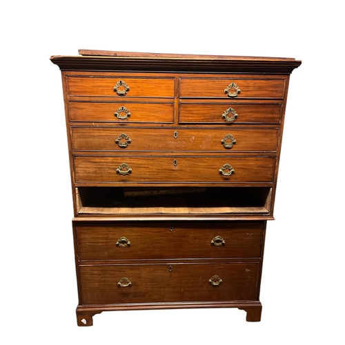 566 - A GEORGIAN MAHOGANY CHEST ON CHEST the moulded cornice above four short and three long graduated dra... 