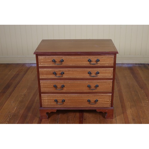 68 - A SHERATON STYLE MAHOGANY AND SATINWOOD INLAID CHEST of four long graduated drawers on bracket feet ... 