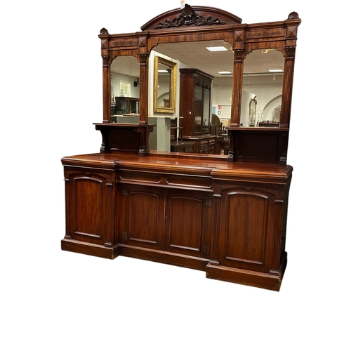 206 - AN EDWARDIAN MAHOGANY MIRRORED BACK SIDEBOARD the superstructure with plate glass mirrors between fl... 