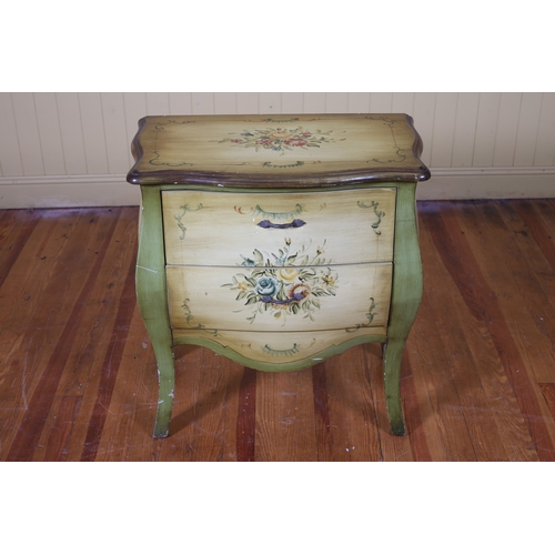 261 - A CONTINENTAL STAINED WOOD AND POLYCHROME CHEST of bombe outline the shaped top above two deep drawe... 