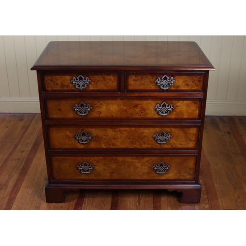 17 - A GEORGIAN STYLE BURR WALNUT CROSSBANDED CHEST of two short and three long graduated drawers with br... 