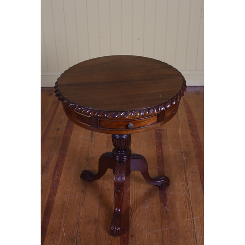 179 - A CHIPPENDALE STYLE MAHOGANY OCCASIONAL TABLE of circular outline with gadrooned rim above a frieze ... 