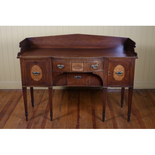 21 - A 19TH CENTURY MAHOGANY AND SATINWOOD INLAID SIDEBOARD of rectangular bowed outline the shaped top w... 