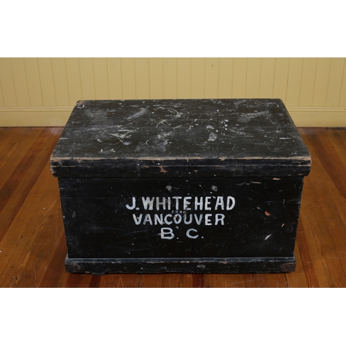 229 - A VINTAGE PINE TRUNK of rectangular form with hinged lid and moulded apron inscribed 'J. Whitehead V... 