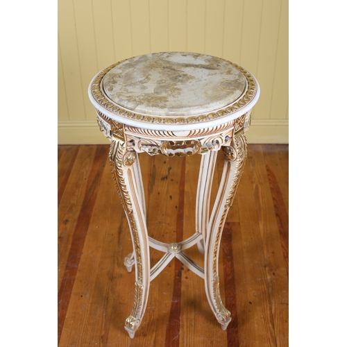 23 - A CONTINENTAL CREAM PAINTED AND PARCEL GILT OCCASIONAL TABLE of circular outline inset with a veined... 