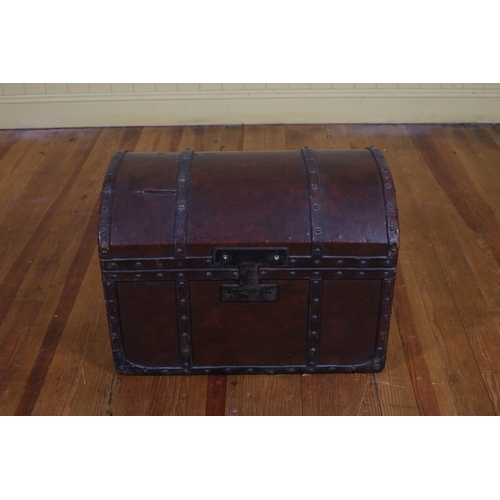 230 - A VINTAGE REXINE AND LEATHER BOUND DOME SHAPED TRUNK with steel carrying handles (lid fixed) 45cm (h... 