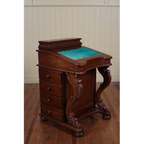 233 - A VICTORIAN STYLE MAHOGANY DAVENPORT the superstructure with hinged compartment and baize lined hing... 