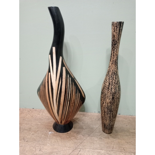 244 - TWO COMPOSITION VASES one of irregular outline the other of bulbous outline The larger 70cm (h) x 30... 