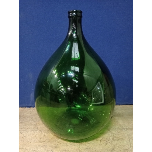 246 - AN ITALIAN GREEN GLASS DEMIJOHN 65cm (h) x 40cm (d)