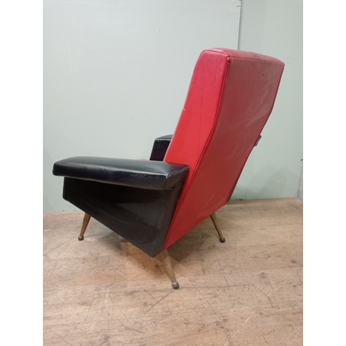 266 - A PAIR OF MID CENTURY TWO COLOURED UPHOLSTERED CLUB CHAIRS the rectangular back and seat with shaped... 