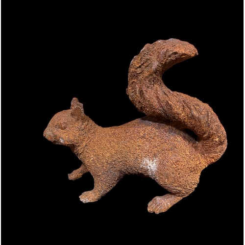 298 - A CAST IRON FIGURE modelled as a squirrel 27cm (h) x 28cm (w)